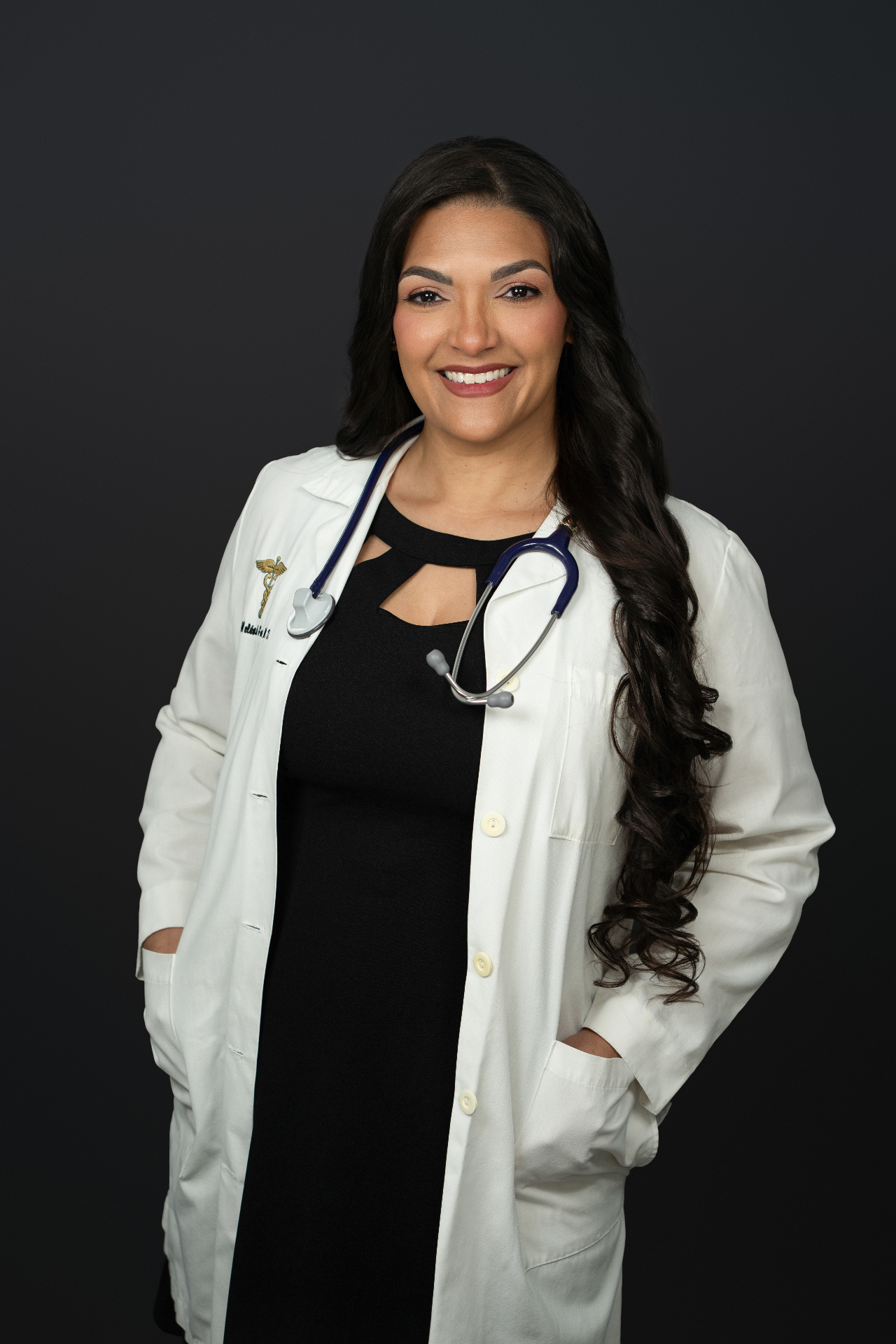 Dra. Melanie Meléndez García con bata